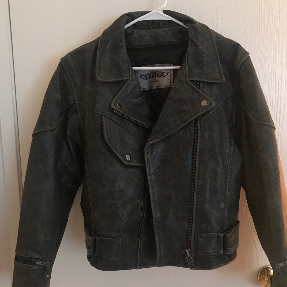 Womens brand new never worn heavy leather jacket. Washout black in color.